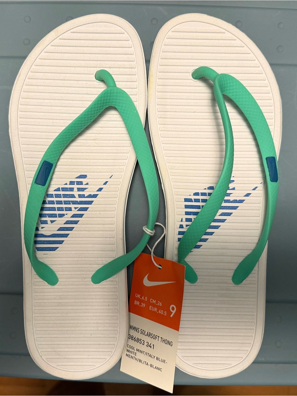 Women’s Nike flip flops size 9.